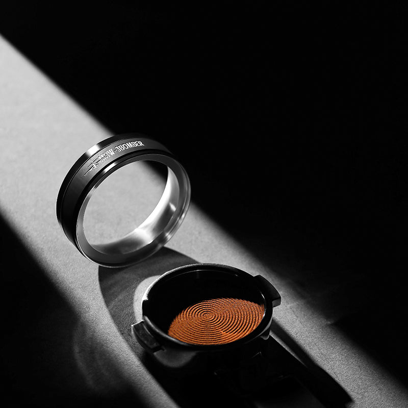 MHW-3BOMBER T5830 YU magnetic dosing ring on a counter beside a separate coffee tool; other accessories not included
