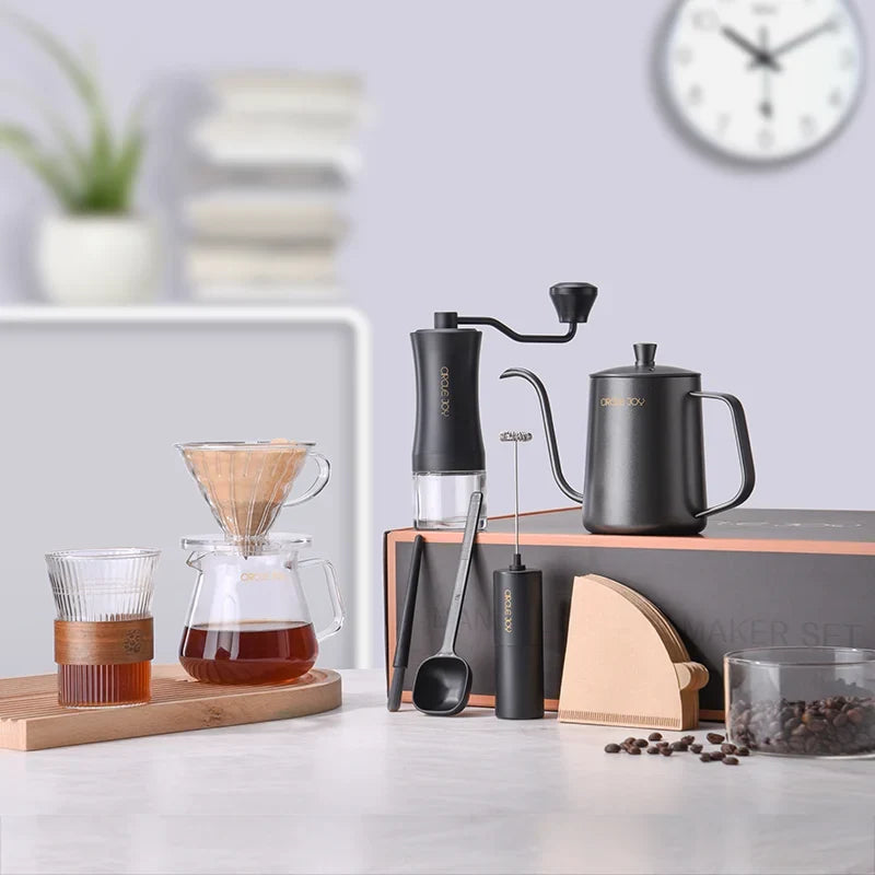 Circle Joy coffee tools including a manual grinder, kettle, dripper and server arranged together