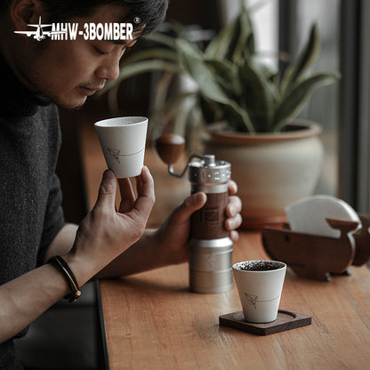 MHW-3BOMBER Winter Cup 120 ml, white cup lifestyle view