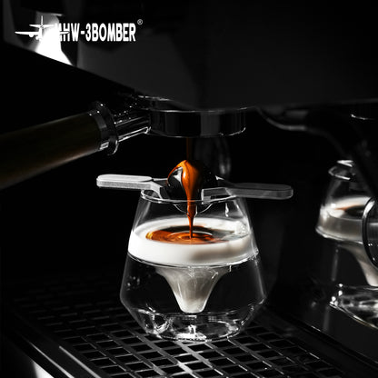 MHW-3BOMBER IH6659S 30 mm chilling ball beneath an espresso stream; holder and equipment are separate