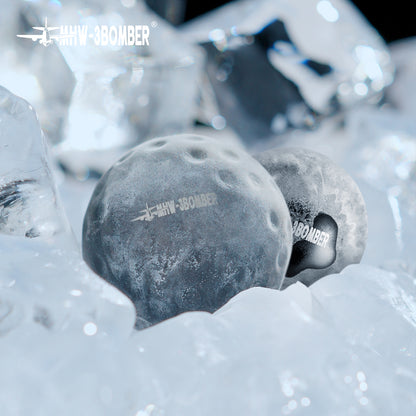 MHW-3BOMBER IH6658L 42 mm chilling balls resting on ice before use; ice is a demonstration prop