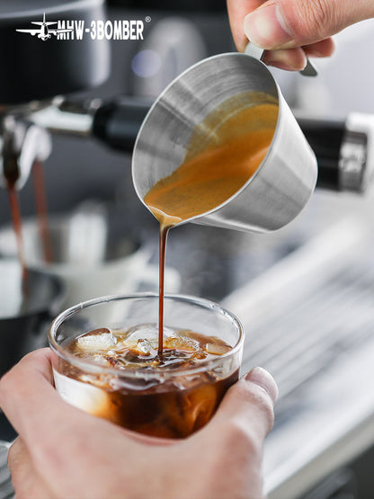MHW-3BOMBER single-spout measuring cup pouring a coffee drink