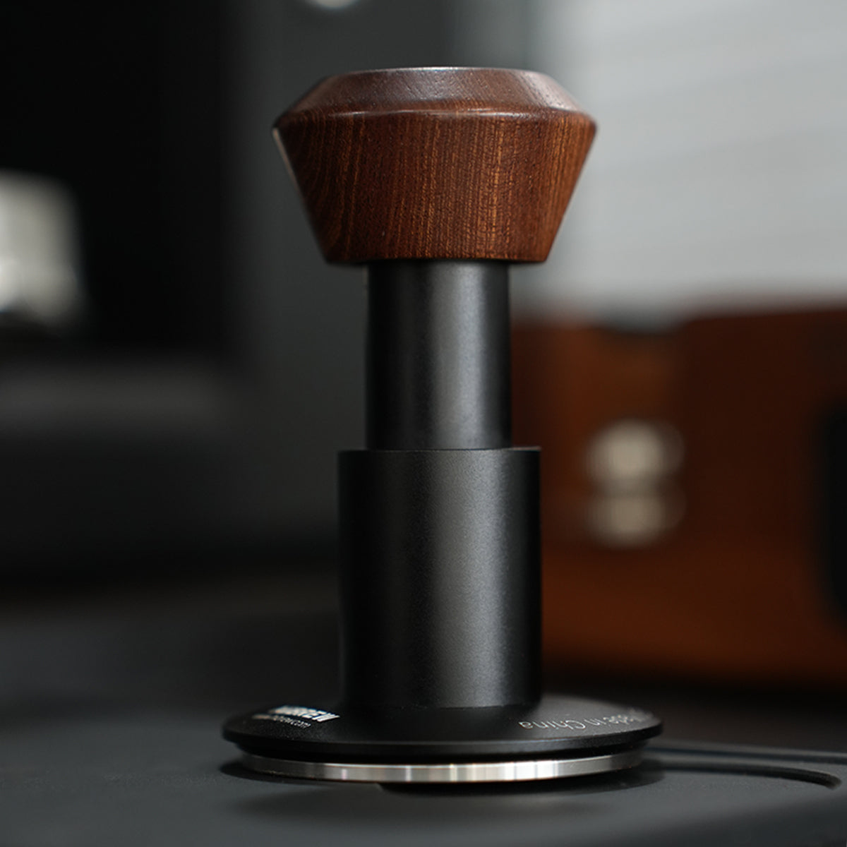 HiBREW Master 58mm Coffee Tamper — upright tool on a worktop. Demonstration props are not included.