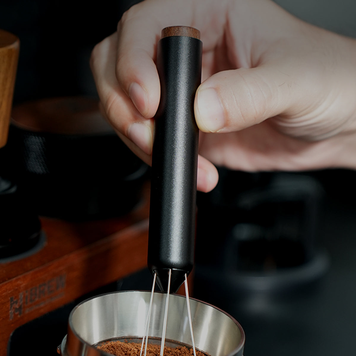 HiBREW Master Coffee WDT Tool — needle distribution demonstration above a coffee basket. Demonstration props are not included.