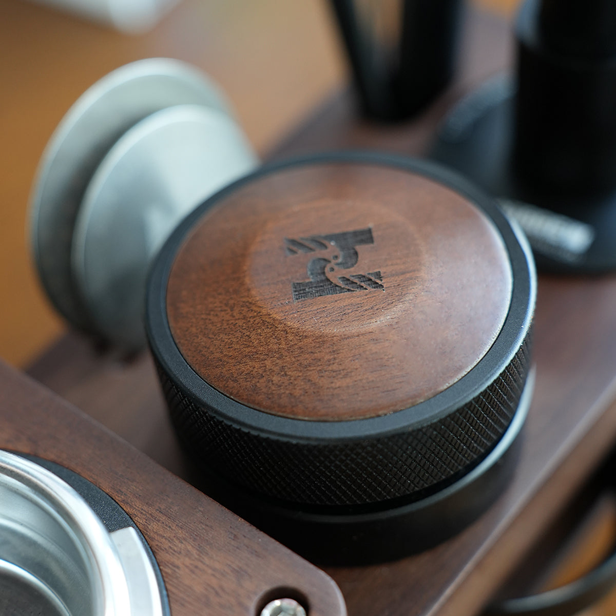 HiBREW Master 58mm Coffee Distributor — wooden top and knurled grip close-up. Demonstration props are not included.