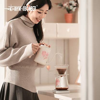 G5199P Heartbeat artwork server during pour-over brewing with a person wearing a headband. Other pictured tools, coffee and props are not included.