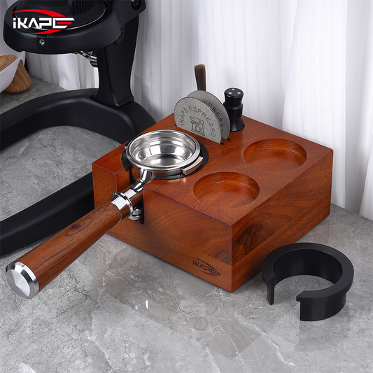 IKAPE seven-in-one walnut tamping station with a portafilter on a coffee counter; coffee tools shown are sold separately.