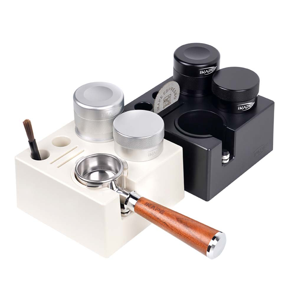 IKAPE black ABS station behind a separate white comparison unit; coffee tools sold separately