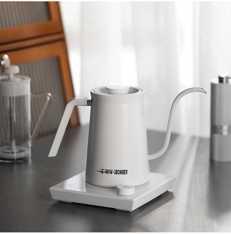 White Assassin kettle, handle, curved spout and temperature-control base
