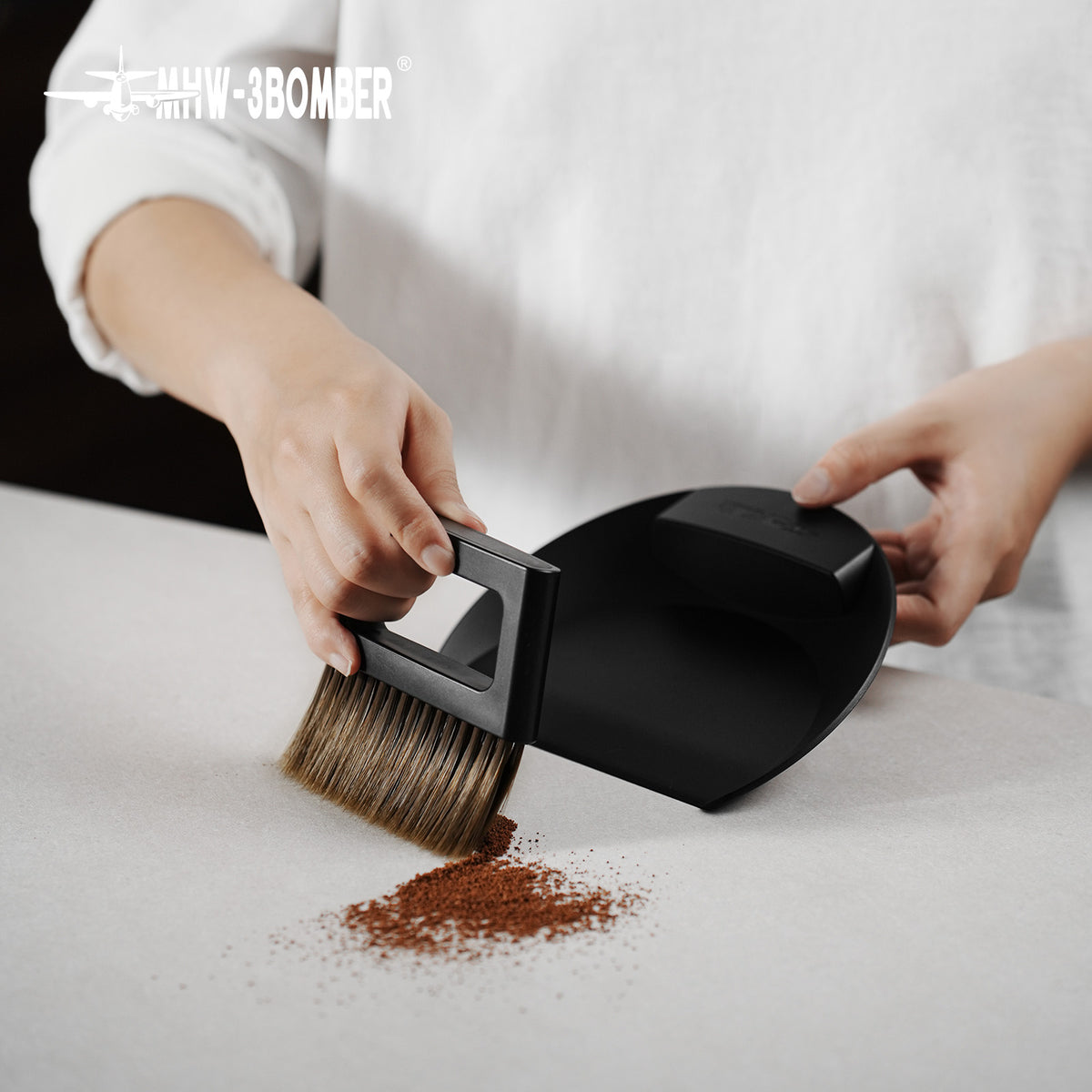 B5188B brush sweeping coffee grounds from a work surface