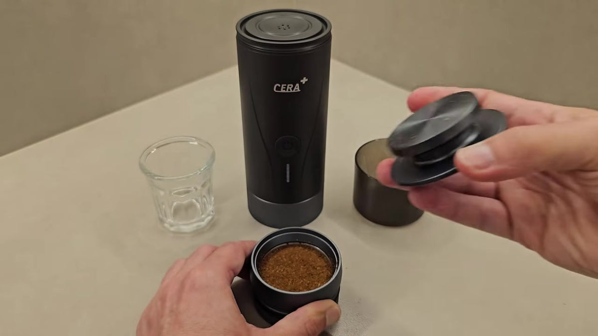 CERA+ PCM04A black portable espresso machine — filter basket and grounds