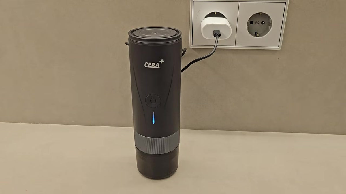 CERA+ PCM04A black portable espresso machine — charging in use