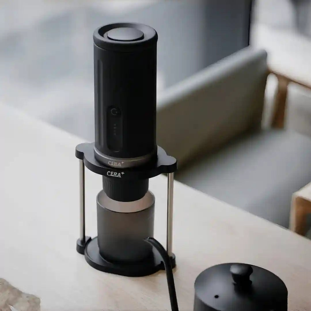CERA+ SD01 stand with a CERA portable brewer fitted over a cup