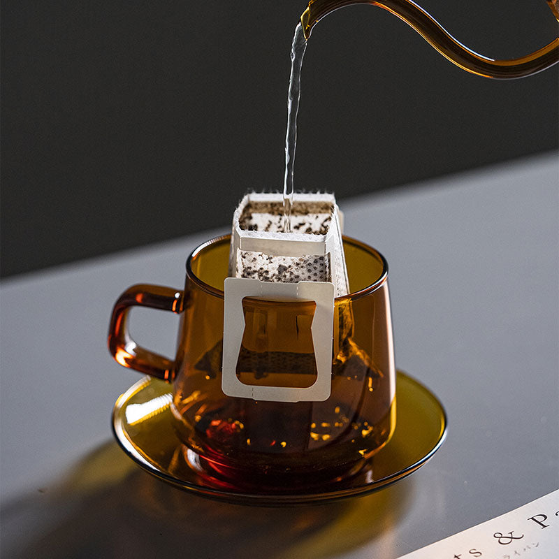 Circle Joy CJ-CF01 cup and saucer used with a drip coffee bag; bag and kettle not included