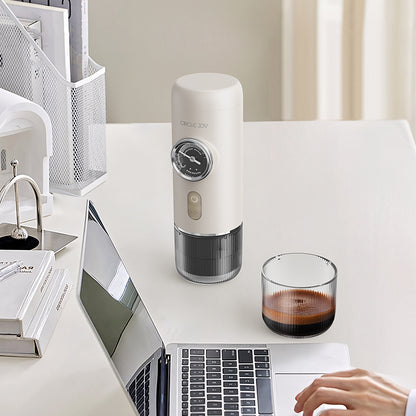 Circle Joy CJ-KFJ04 PLUS White portable espresso maker in an office