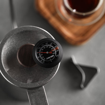 Close view of the MHW-3BOMBER CT5615B analogue dial in a milk pitcher