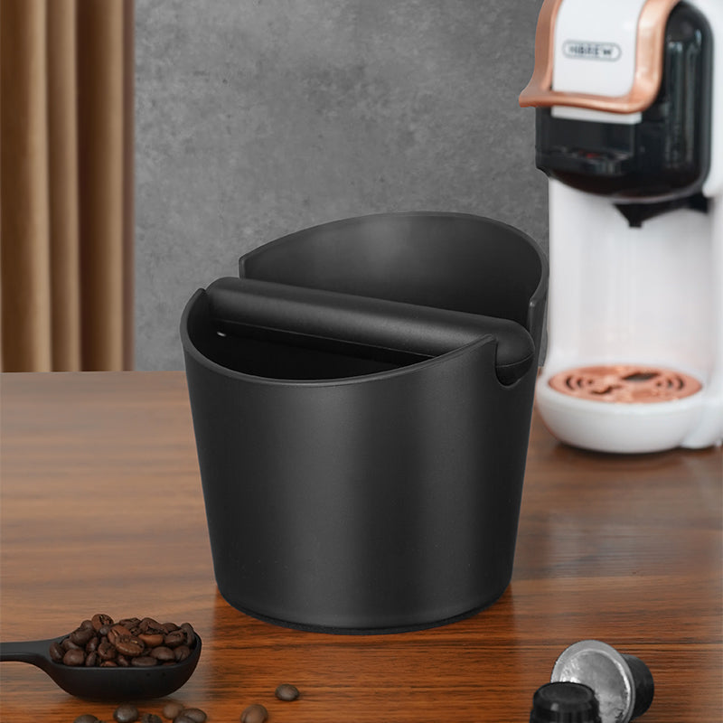 HiBREW Coffee Knock Box — countertop view beside a coffee machine. Demonstration props are not included.