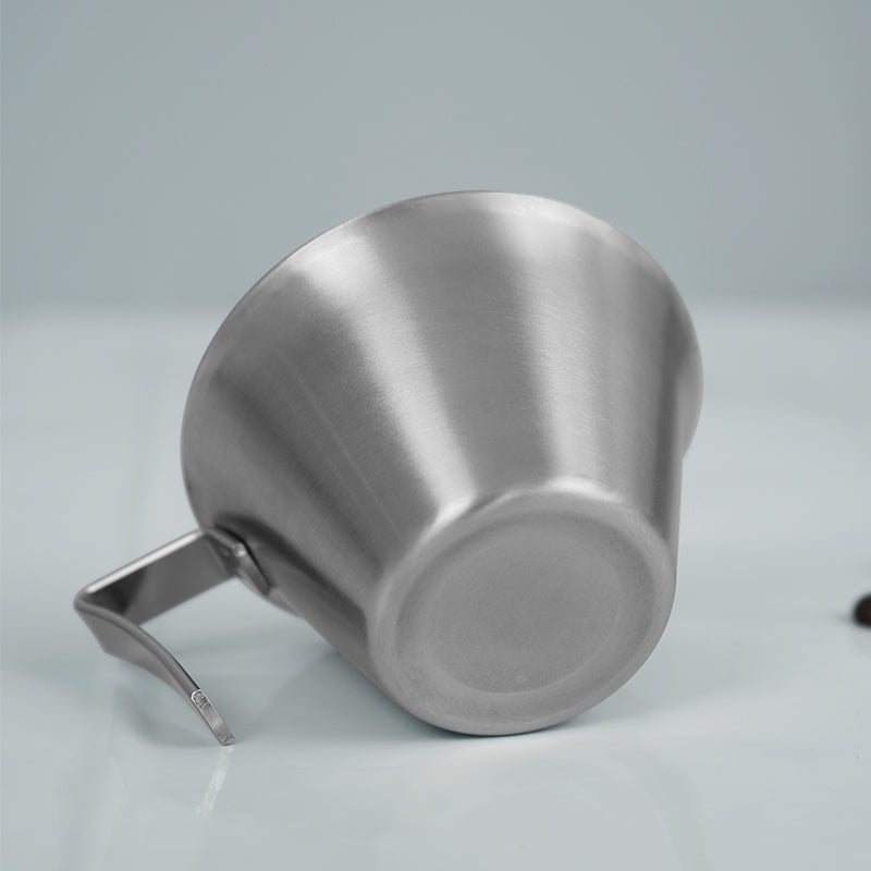 HiBREW 100ml Espresso Measuring Pitcher — underside and handle view. Demonstration props are not included.