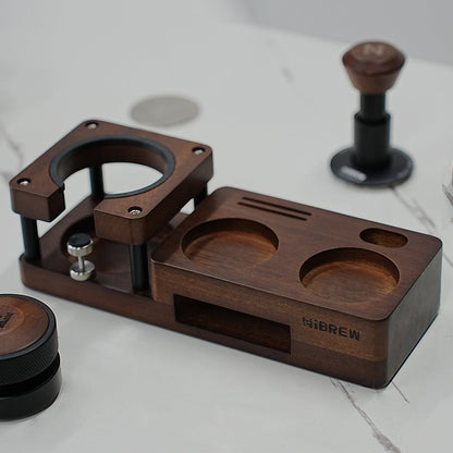 HiBREW Wood Tamping Station — angled countertop view with separate tools nearby. Demonstration props are not included.