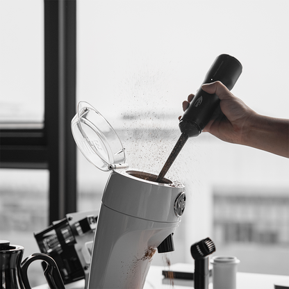 IKAPE Black vacuum cleaning a grinder