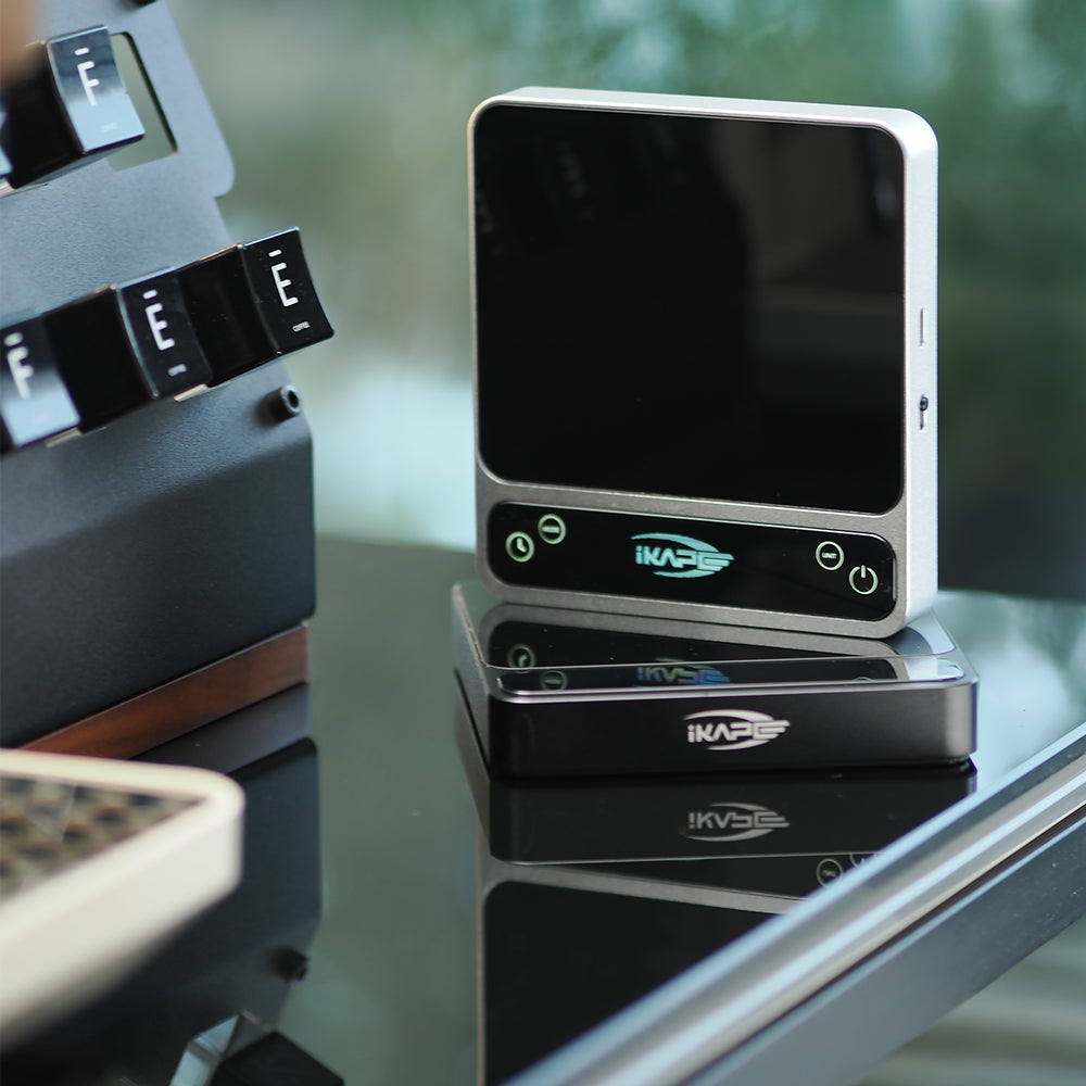 IKAPE V2 Pro silver and black scale configurations on a coffee bar