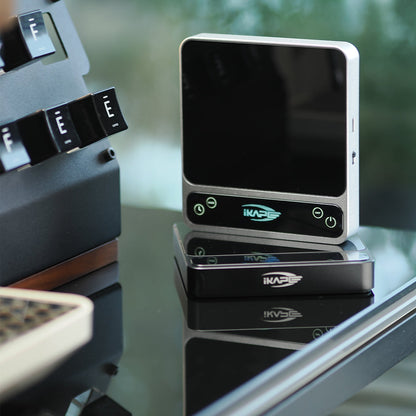 IKAPE V2 Pro silver and black scale configurations on a coffee bar