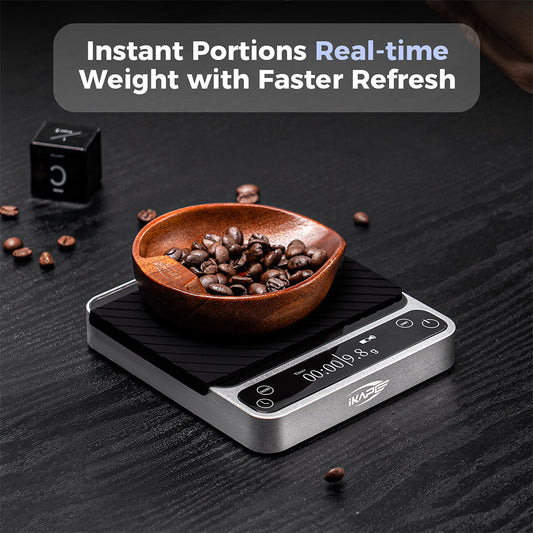 IKAPE V2 Pro silver coffee scale weighing a bowl of beans