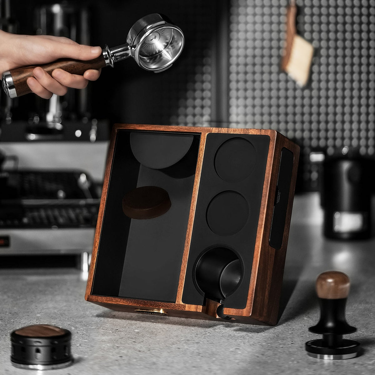 MHW-3BOMBER Walnut CH6624 multifunction knock box, overhead view with portafilter; tools are scene props