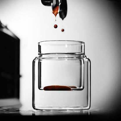 MHW-3BOMBER Clear H-shaped 160 ml DW glass cup receiving espresso; coffee machine is a prop