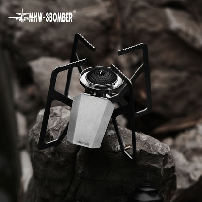 MHW-3BOMBER MET stove shown on a rock surface, separate supplier angle