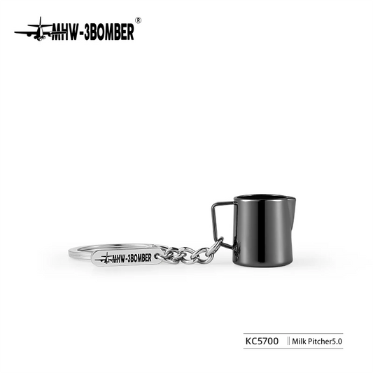 MHW-3BOMBER KC5700 coffee keychain, milk-pitcher design, isolated view.