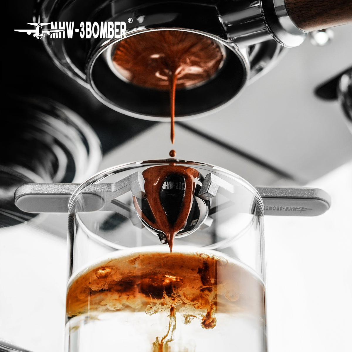 MHW-3BOMBER IH6659S 30 mm espresso chilling ball in a front close-up brewing scene; holder and other equipment are separate props.