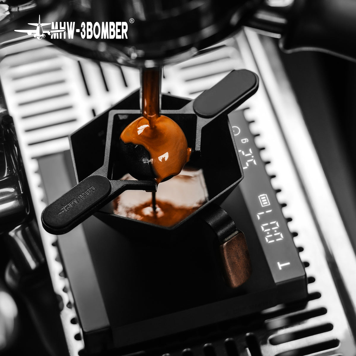 MHW-3BOMBER IH6659S 30 mm espresso chilling ball in a top-down brewing scene above a black cup; holder, cup and other equipment are separate props.