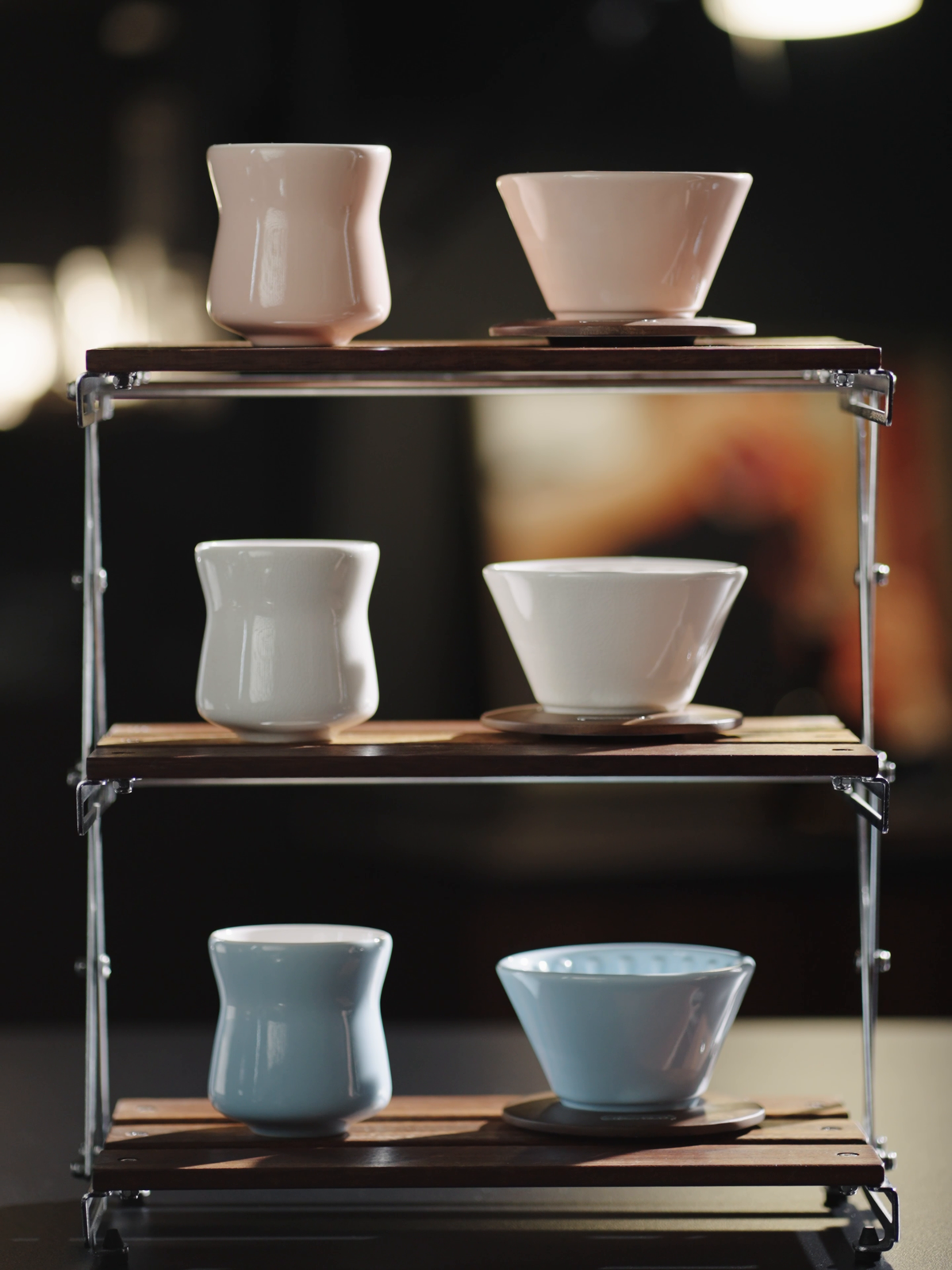 MHW-3BOMBER FC6565P Lotus Pink ceramic dripper with wooden base on the upper shelf; cups and other colours sold separately