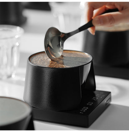 MHW-3BOMBER black and silver cupping spoon used with coffee
