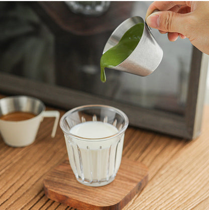 MHW-3BOMBER G5140 single-spout measuring cup pouring a green drink; receiving glass and scene props not included