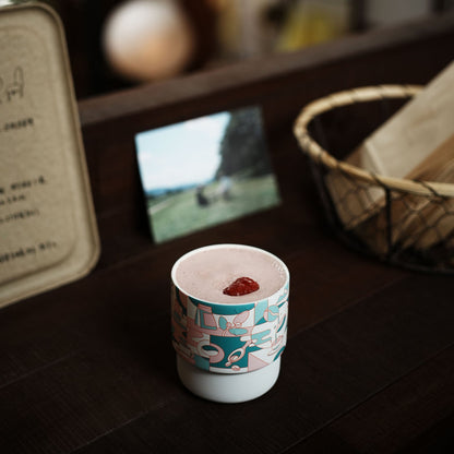MHW-3BOMBER DW6908PG Pink Green Coffee Story White Swirl Cup on a bookshelf; display props not included