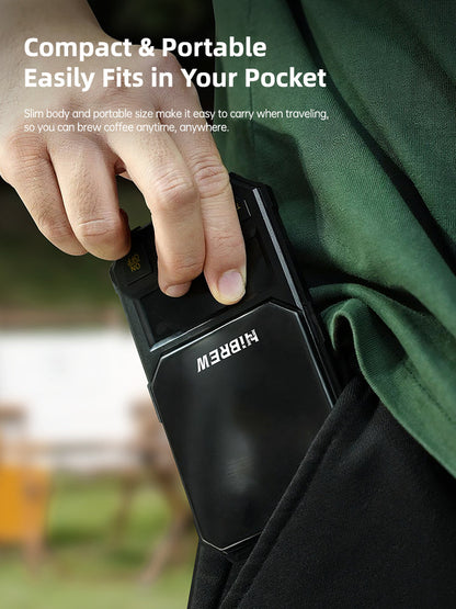 HiBREW black 1000g coffee scale — Black four-button scale shown in a trouser pocket; manufacturer portability demonstration.