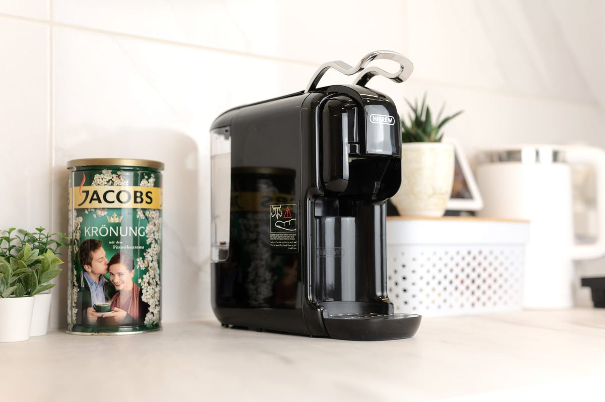 HiBREW H2B Black coffee machine from the front and side, with the brewing lever raised; countertop props are not included