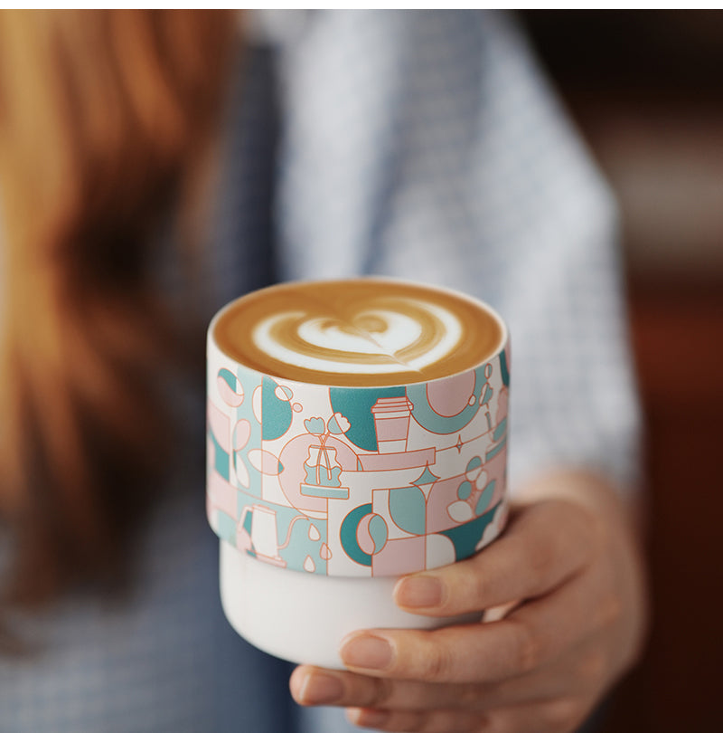 MHW-3BOMBER DW6908PG Pink Green Swirl Cup — latte held in hands