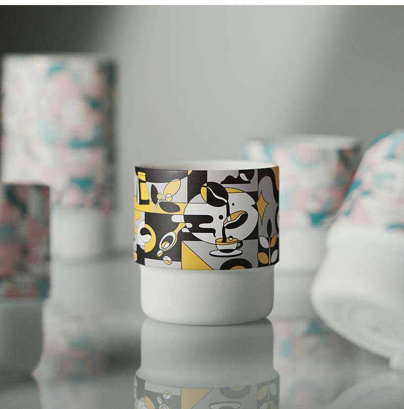 MHW-3BOMBER DW6909BY Black Gold Swirl Cup — tabletop view with other listed artwork behind