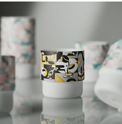 MHW-3BOMBER DW6909BY Black Gold Swirl Cup — tabletop view with other listed artwork behind
