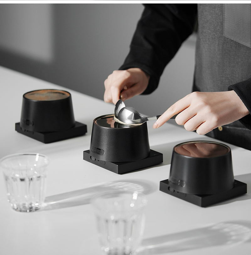 MHW-3BOMBER black cupping bowls in a sample tasting setup