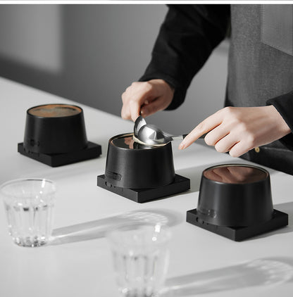 MHW-3BOMBER black cupping bowls in a sample tasting setup