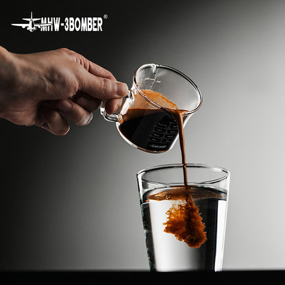 MHW-3BOMBER G5059 clear glass measuring cup pouring coffee into a glass