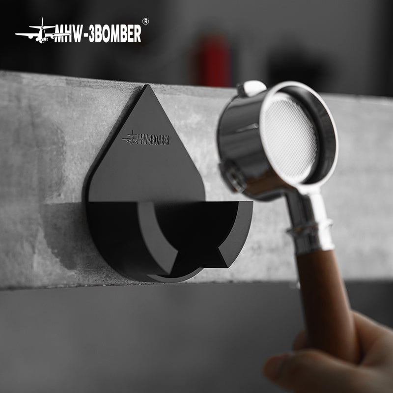 MHW-3BOMBER DPH5713B Black holder holding a portafilter; portafilter not included