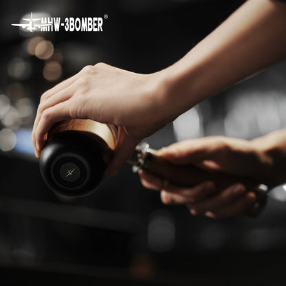MHW-3BOMBER DR6543B Nova Dosing Cup, 58 mm, Obsidian Black with walnut — inverted dosing into a portafilter. Coffee, equipment, cups and other scene props are not included.