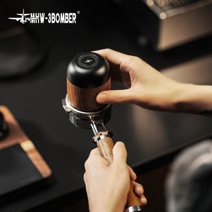 MHW-3BOMBER DR6543B Nova Dosing Cup, 58 mm, Obsidian Black with walnut — front view of grounds transfer. Coffee, equipment, cups and other scene props are not included.