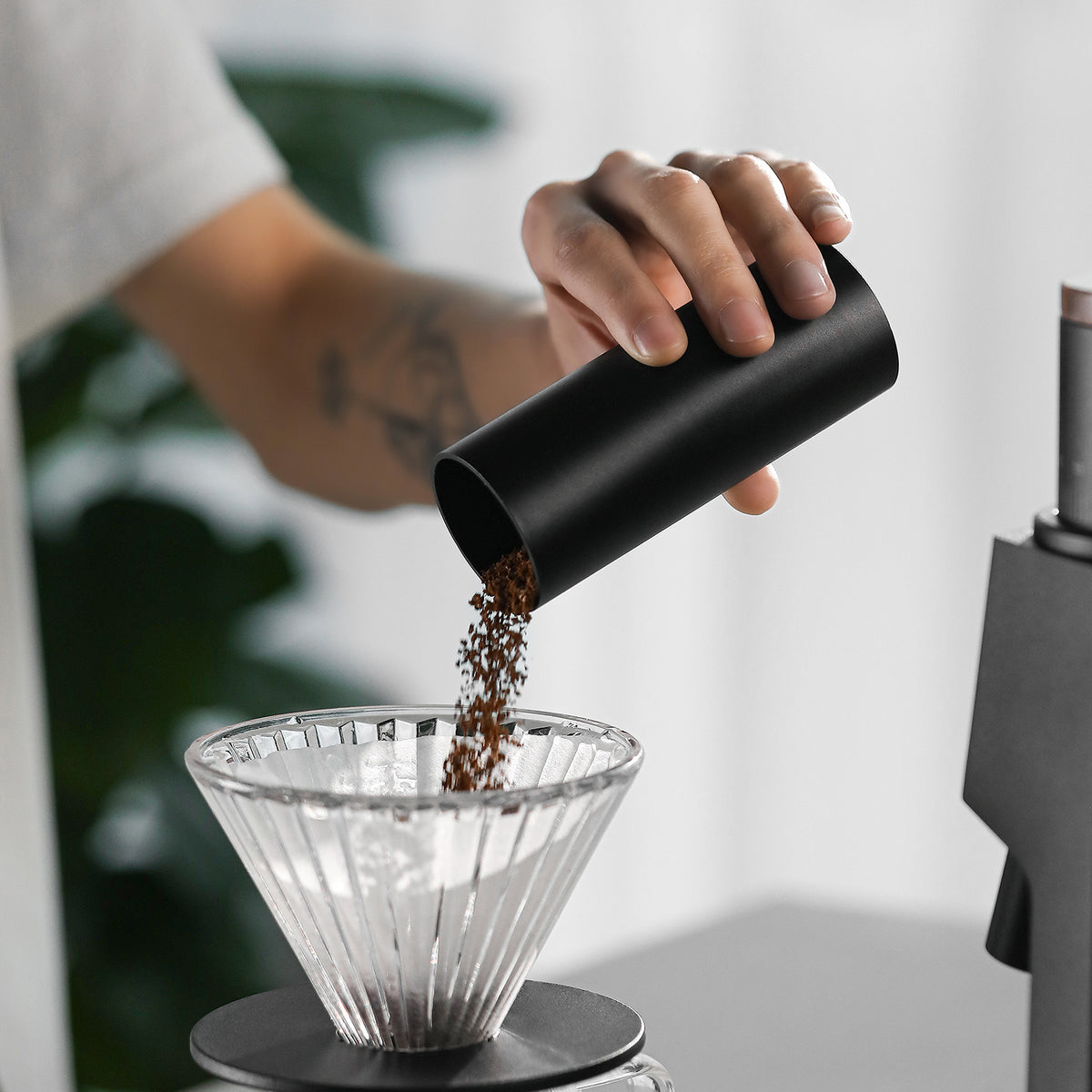 Black Sniper dosing cup used over a filter dripper