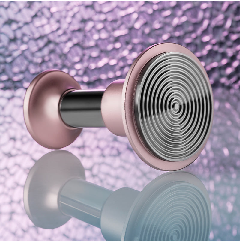 Pink 58.35 mm Knight Impact Tamper ripple underside and body on a reflective surface